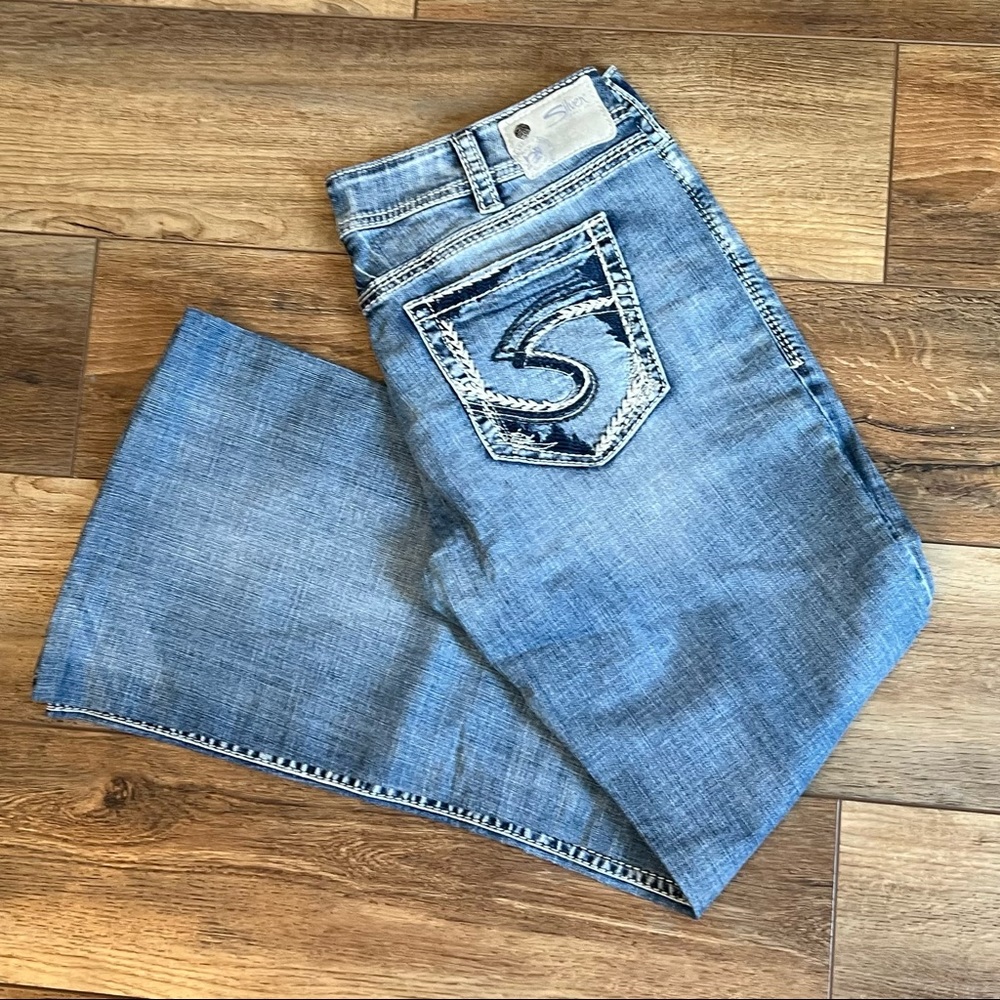 Silver jeans Suki super stretch mid flare 34/34